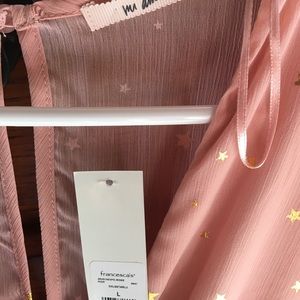 Peach flowing dress with small gold stars